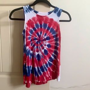 This is a tie-dye red white and blue tank top.
